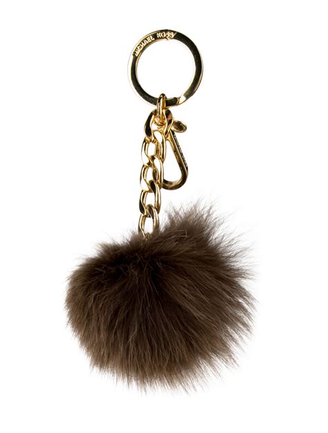 michael kors faux fur pom pom